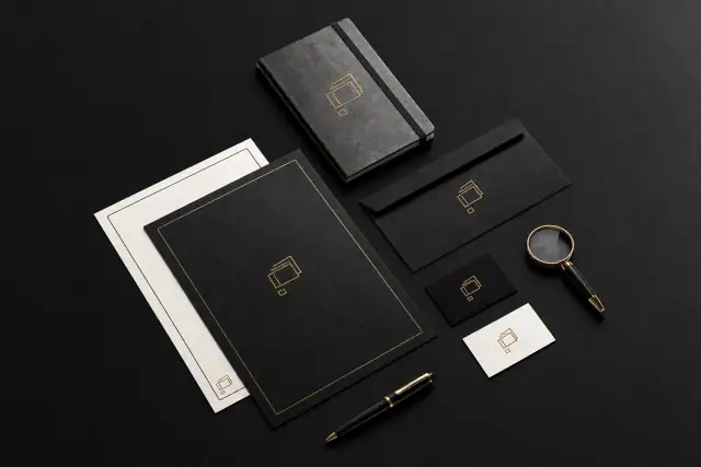 Studio Note stationery and business card mockup in black with gold details